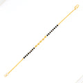 22k-gold-fashionable-black-bead-bracelet