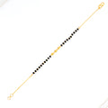 22k-gold-attractive-black-bead-bracelet