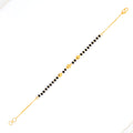 22k-gold-dainty-black-bead-bracelet