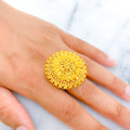 gold-decorative-graduated-flower-accented-statement-ring