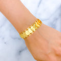 21k-gold-royal-interlinked-coin-bracelet