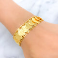21k-gold-royal-interlinked-coin-bracelet