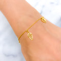 21k-gold-radiant-striped-charm-bracelet