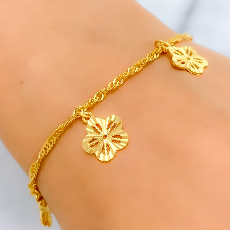 21k-gold-sleek-shiny-floral-charm-bracelet