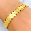 21k-gold-dainty-hinged-coin-bracelet