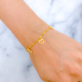 21k-gold-dressy-delicate-open-heart-charm-bracelet