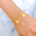 21k-gold-classy-evergreen-coin-charm-bracelet