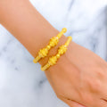 22k-gold-Ornate Reflective Beaded Pipe Bangles