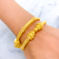 22k-gold-Ornate Reflective Beaded Pipe Bangles