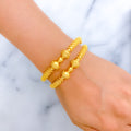 22k-gold-Extravagant Beaded Striped Bangles