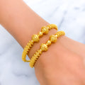 22k-gold-Extravagant Beaded Striped Bangles