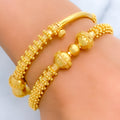 22k-gold-Extravagant Beaded Striped Bangles