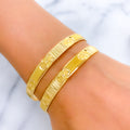 22k-gold-Plush Reflective Floral Bangles