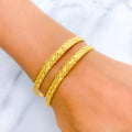 22k-gold-Mod Engraved Leaf Adorned Bangles