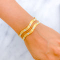 22k-gold-Fashionable Wavy Dotted Bangles