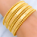 22k-gold-Radiant Parallel Multi Bead Cuff