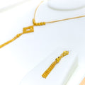 Stylish Flowing Tassel 22k Gold Set