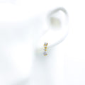 18k-gold-petite-floral-diamond-hanging-earrings