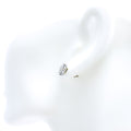 18k-gold-shimmering-star-accented-diamond-earrings