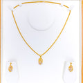 Delightful Floral Oval 22k Gold Pendant Set