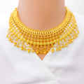 Paisley Accented Tasseled 22k Gold Bridal Necklace Set 
