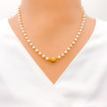 22k-gold-elevated-pearl-necklace