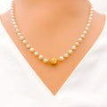 22k-gold-elevated-pearl-necklace