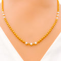 22k-gold-simple-pearl-accented-gold-necklace