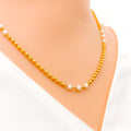 22k-gold-simple-pearl-accented-gold-necklace