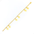 21k-gold-fancy-dangling-heart-charm-bracelet
