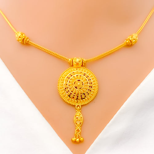 22k-gold-radiant-round-tassel-drop-necklace-set