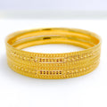 Upscale Radiant Flower-Lined 22k Gold Bangles