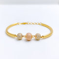 Graceful Dotted Three-Tone 22k Gold Bangle Bracelet