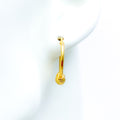 22k-gold-Shiny Faceted Orb Hoop Earrings