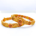 Vibrant Floral 22k Gold Lakshmi Bangles