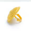 gold-shimmering-beaded-umbrella-statement-ring