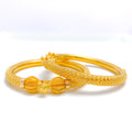 Luxurious Elevated Pipe Bangles