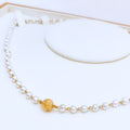 22k-gold-elevated-pearl-necklace