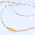 22k-gold-orb-accented-pearl-necklace