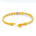 22k-gold-grand-orb-wire-bangle-bracelet