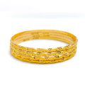 22k-gold-Reflective Wavy Textured Bangles