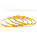 22k-gold-Reflective Wavy Textured Bangles