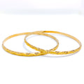 22k-gold-Elegant Evergreen Wavy Gold Bangles