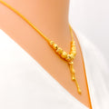 22k-gold-reflective-wavy-bead-hanging-chain-necklace