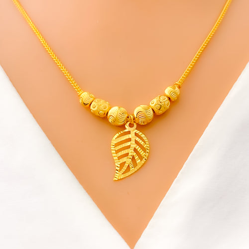 22k-gold-Fancy Dangling Leaf Necklace