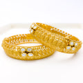 Impressive Set of 2 Kundan Leaf 22k Gold Bangles