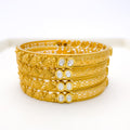 Impressive Set of 2 Kundan Leaf 22k Gold Bangles