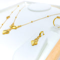 21k-gold-Sparkling Four Petal CZ Necklace Set w/ Bracelet & Ring