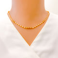 22k-gold-radiant-ornate-pearl-necklace