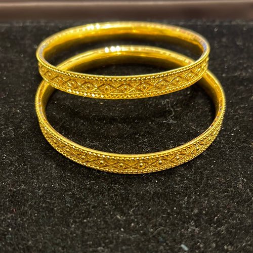 Pair of yellow gold Kara
